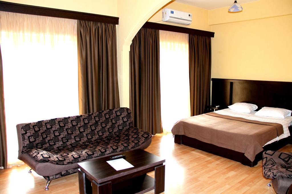 Avenue Hotel Tiflis Habitación foto