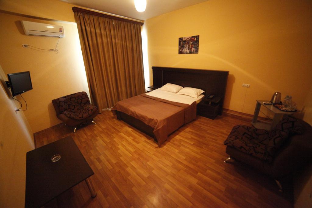 Avenue Hotel Tiflis Habitación foto